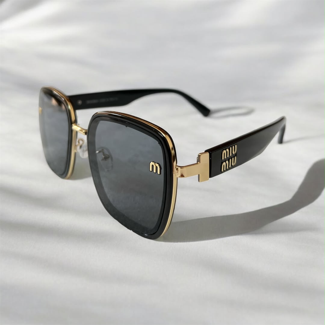 Lunettes de Soleil Oversize Noires et Dorées